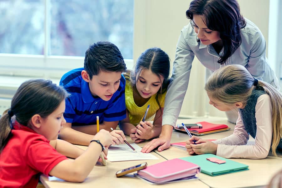 students planning a field trip with their teacher square Heera Holiday Tours & Travels