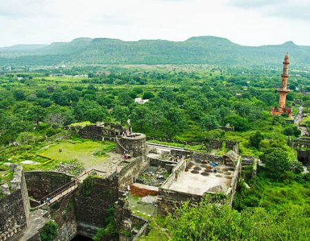 View of kings who ruled from Dauatabad Fort in Aurangabad, Maharashtra, India. Taken this picture from top of the fort and tried to take this panaromic picture of the fort. Its is a lovely time aroung this time in monsoon. Green all around during this time in monsoon and also captured the tourist taking a long walk to the fort.